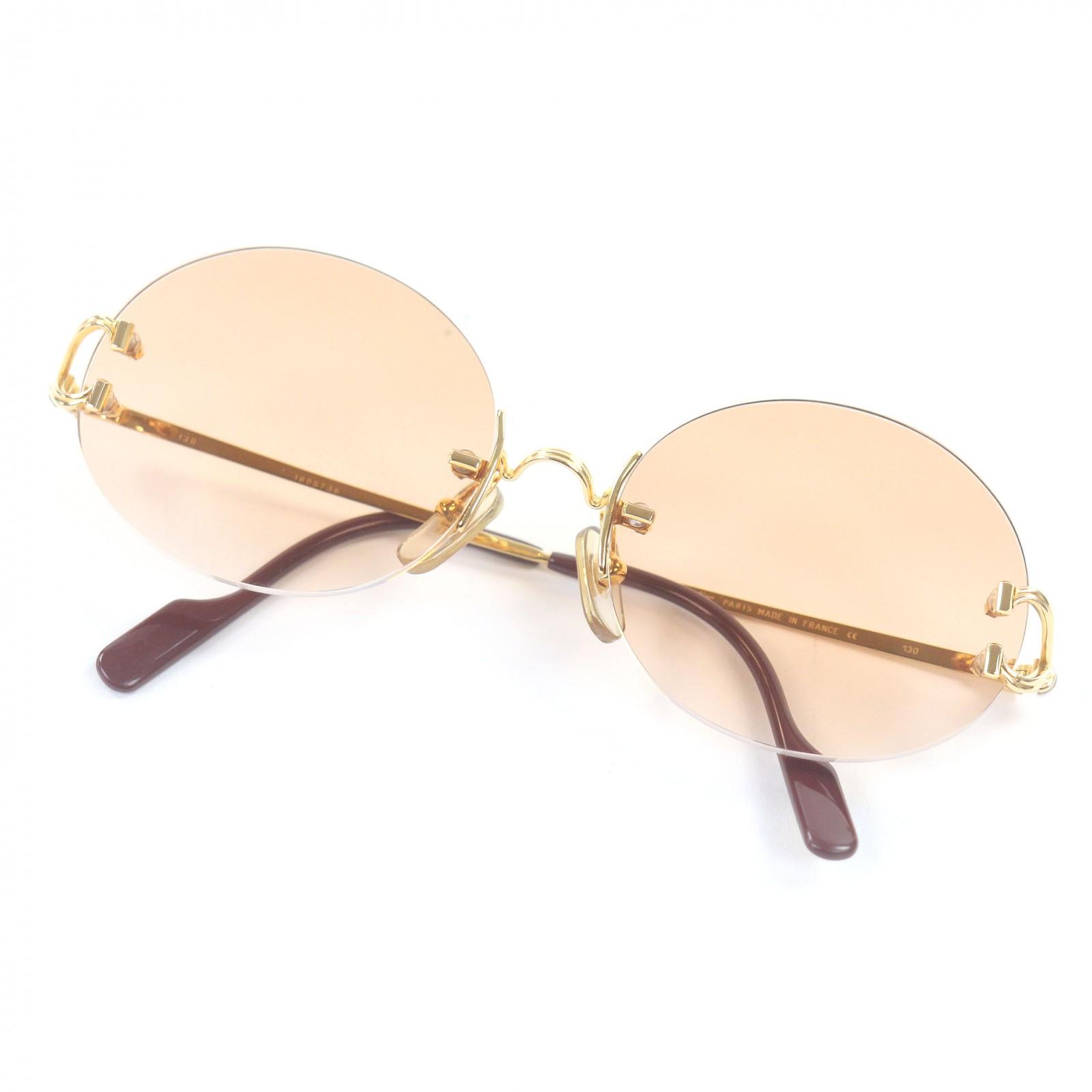 Great Cartier sunglasses Oval Rimless Two-Point gold mens Used
Great Cartier sunglasses Oval Rimless Two-Point gold mens Used