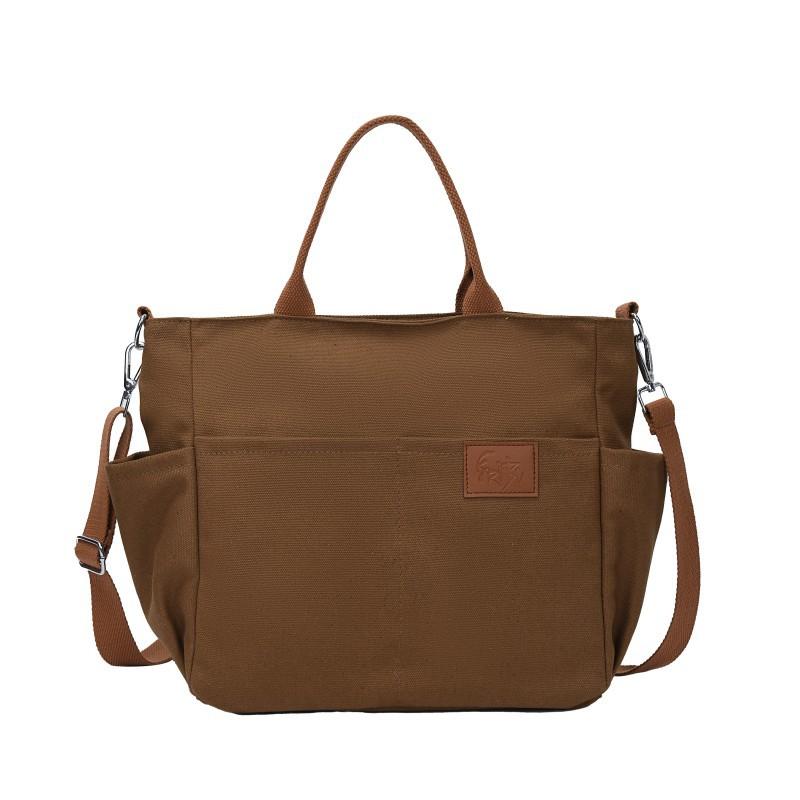 New large-capacity canvas bag shoulder messenger bag women s retro portable shoulder bag fashionable versatile tote bag
New large-capacity canvas bag shoulder messenger bag women s retro portable shoulder bag fashionable versatile tote bag