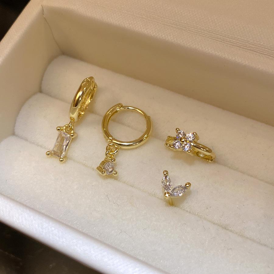 Silver needle zircon round pendant earrings four-piece set retro simple fashion ear buckle light luxury high-end earrings
Silver needle zircon round pendant earrings four-piece set retro simple fashion ear buckle light luxury high-end earrings