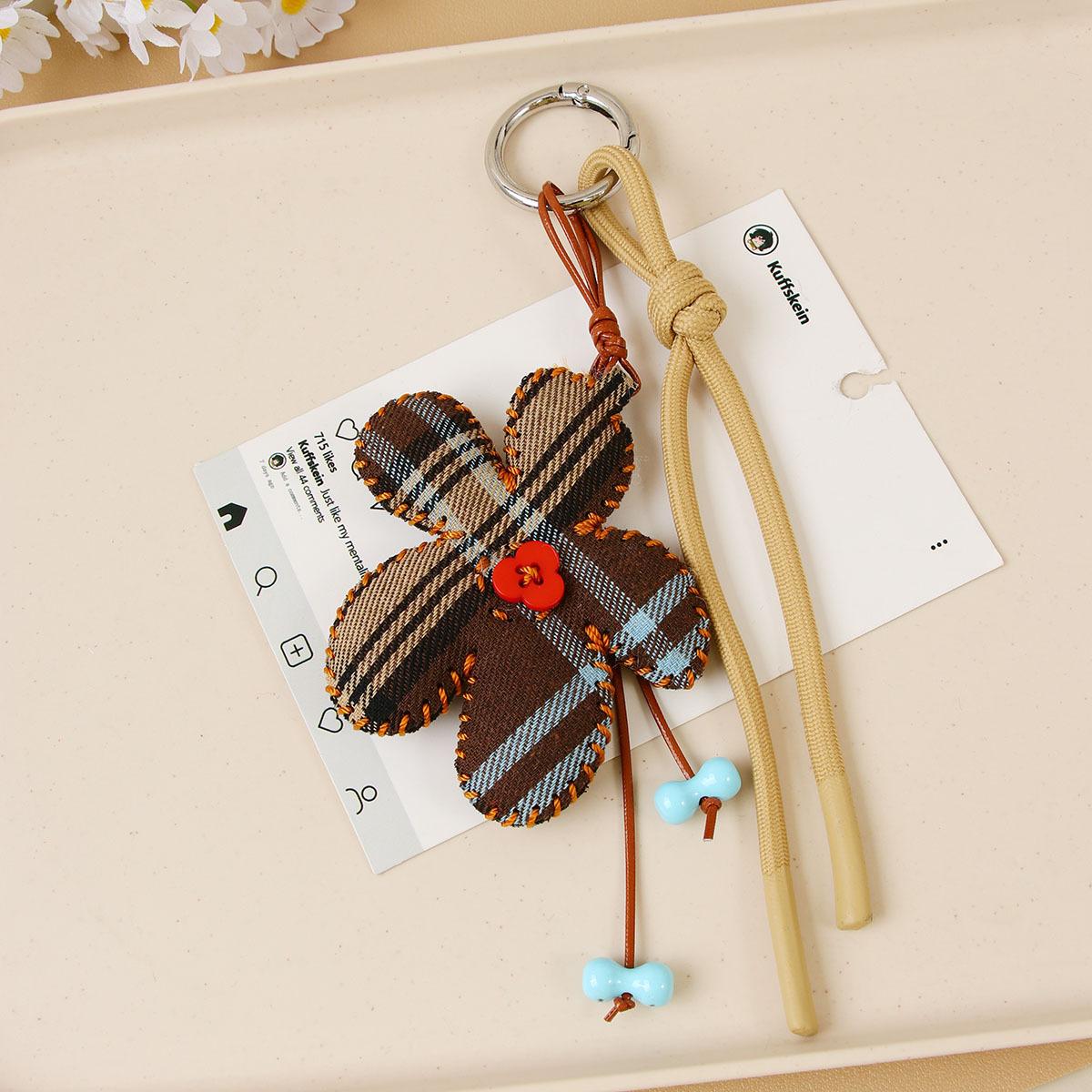 Original cotton-filled plaid 5-petal flower fabric flower handmade beaded bag pendant mobile phone chain versatile clothing accessories коричневий
Original cotton-filled plaid 5-petal flower fabric flower handmade beaded bag pendant mobile phone chain versatile clothing accessories коричневий