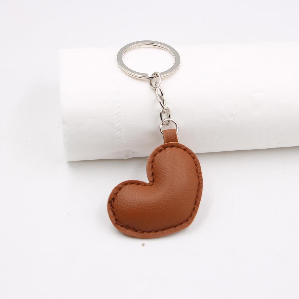 Компактный брелок и подвеска из искусственной кожи в форме сердца
Компактный брелок и подвеска из искусственной кожи в форме сердца