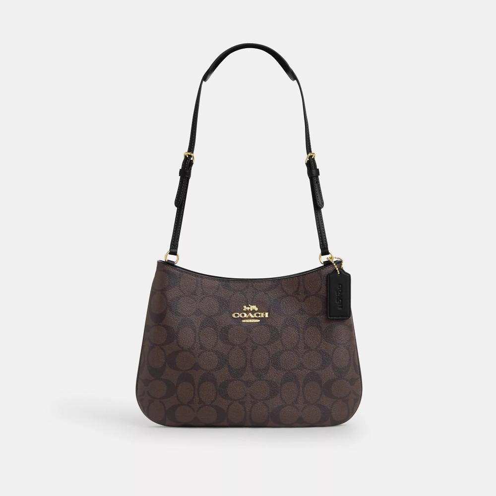 Сумка через плечо Coach Penelope из канвы Signature золотистого, коричневого, черного цвета
Сумка через плечо Coach Penelope из канвы Signature золотистого, коричневого, черного цвета