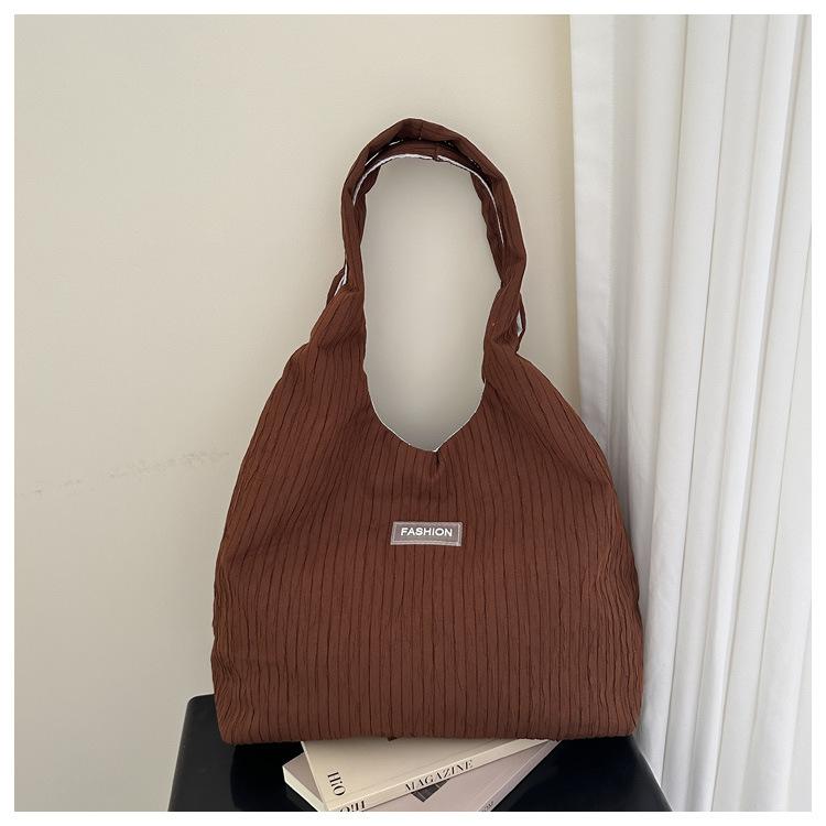 New Women Texture· Simple Shoulder Bag Large Capacity Striped Tote Commuting Bag Simple and Fresh Corduroy Versatile Handle Bag коричневый
New Women Texture· Simple Shoulder Bag Large Capacity Striped Tote Commuting Bag Simple and Fresh Corduroy Versatile Handle Bag коричневый