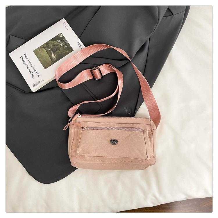 Women s bag 2025 summer new nylon bag leisure bag fashionable multi-compartment messenger bag light shopping shoulder bag рожевий
Women s bag 2025 summer new nylon bag leisure bag fashionable multi-compartment messenger bag light shopping shoulder bag рожевий