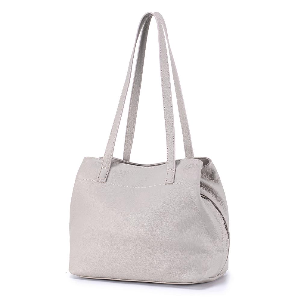 Cowhide Versatile Tote: Genuine Leather Large-Capacity Simple Commuter Shoulder Bag for Women
Cowhide Versatile Tote: Genuine Leather Large-Capacity Simple Commuter Shoulder Bag for Women
