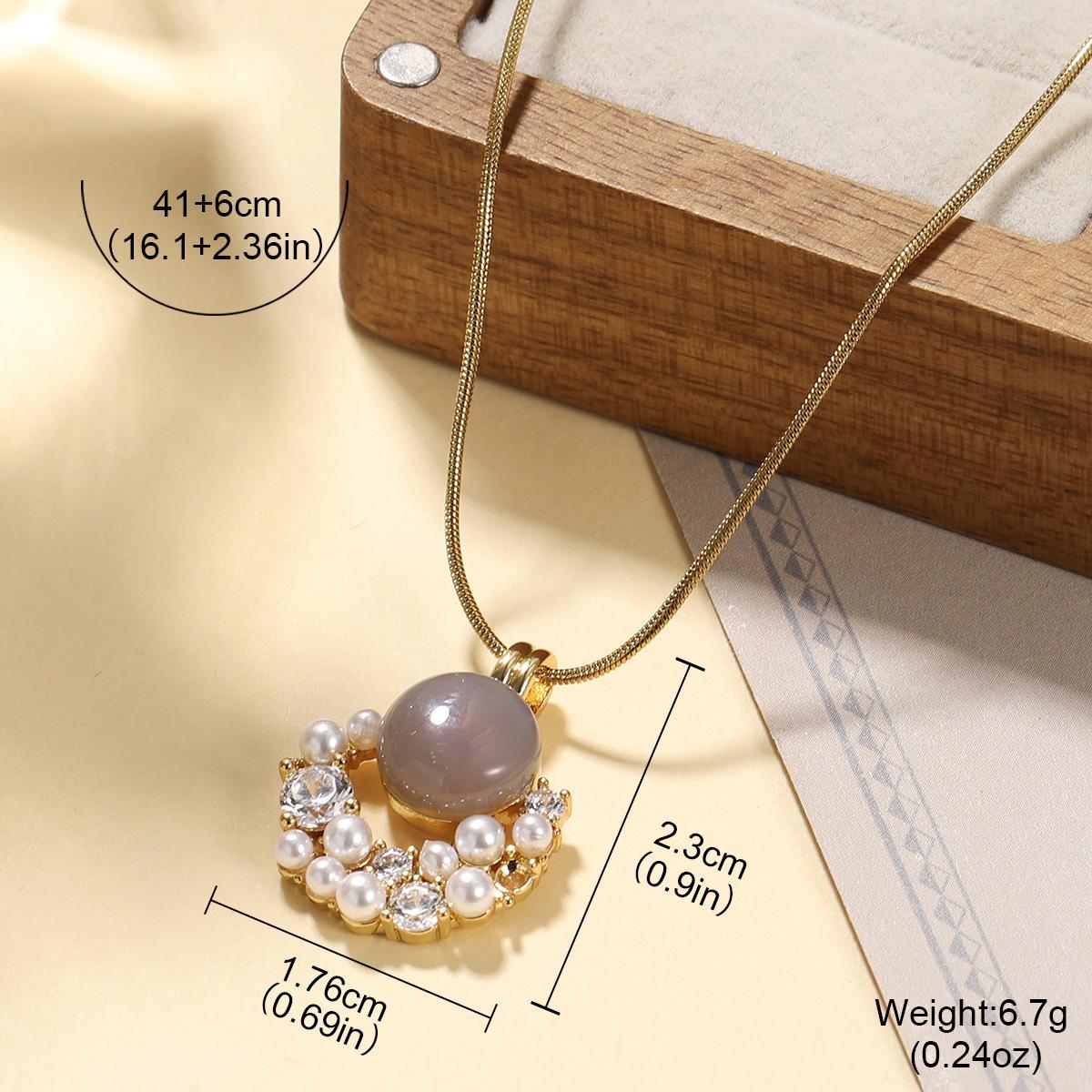 European and American retro natural pearl earrings 18K real gold oil drop pendant zircon necklace autumn and winter light luxury collarbone
European and American retro natural pearl earrings 18K real gold oil drop pendant zircon necklace autumn and winter light luxury collarbone