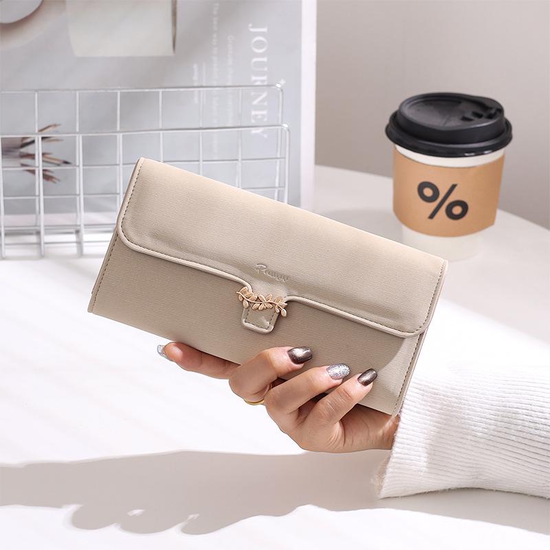 Women s Korean-Style PU Leather Wallet with Metal Buckle and Phone Compartment
Women s Korean-Style PU Leather Wallet with Metal Buckle and Phone Compartment