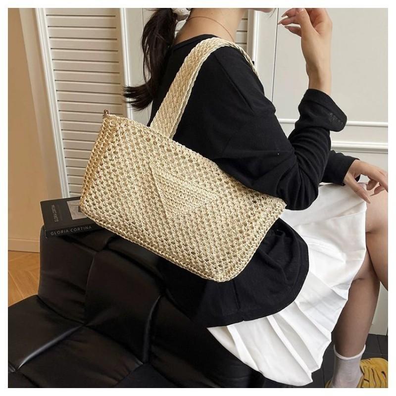 Straw Bags Female Niche All-matching Casual Tote Seaside Vacation One-shoulder Cross-body 31x8x17 off білий колір
Straw Bags Female Niche All-matching Casual Tote Seaside Vacation One-shoulder Cross-body 31x8x17 off білий колір