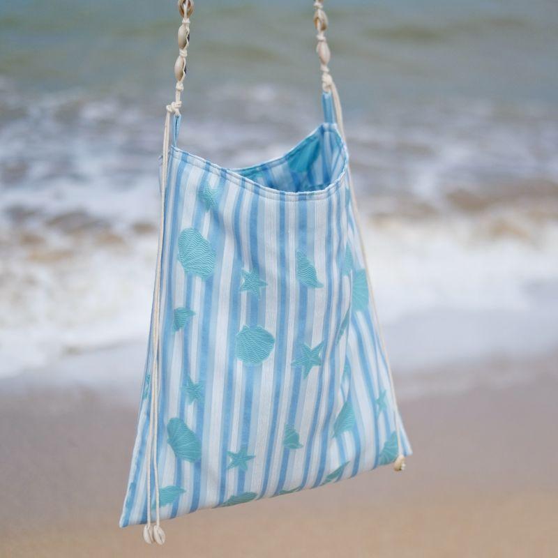 Sapana2025 Summer Vacation Trip Shoot Navigation Series Light Blue Organza Stripe Marine Shell Tassel Messenger Bag Blue and white shell strap crossbody bag
Sapana2025 Summer Vacation Trip Shoot Navigation Series Light Blue Organza Stripe Marine Shell Tassel Messenger Bag Blue and white shell strap crossbody bag