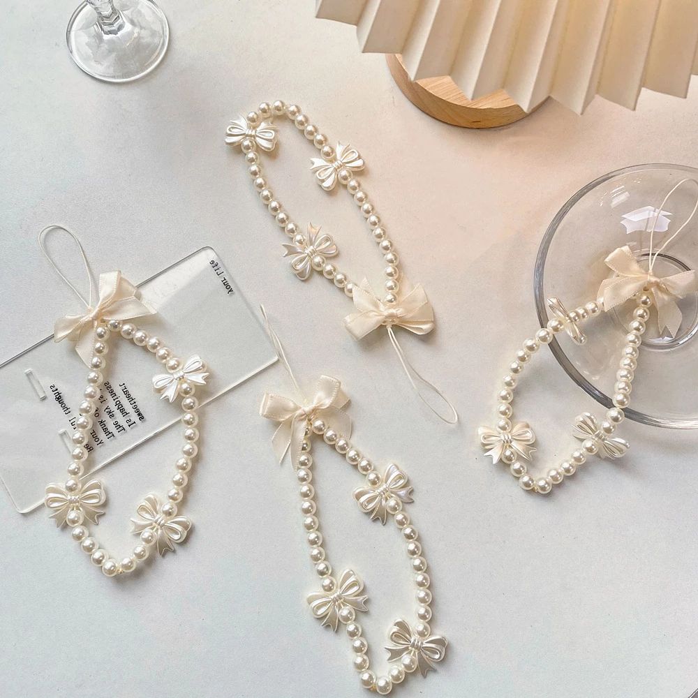 Short Rope Pearl Bow Acrylic Beaded Phone Charm Mobile Phone Straps Wrist Hand Lanyard Hand Strap As picture
Short Rope Pearl Bow Acrylic Beaded Phone Charm Mobile Phone Straps Wrist Hand Lanyard Hand Strap As picture