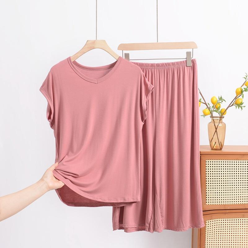 Модальный комплект с V-образным вырезом, короткими рукавами и брюками капри, свободный повседневный комплект-двойка большого размера для женщин, можно носить поверх домашней одежды 8XL розовый
Модальный комплект с V-образным вырезом, короткими рукавами и брюками капри, свободный повседневный комплект-двойка большого размера для женщин, можно носить поверх домашней одежды 8XL розовый