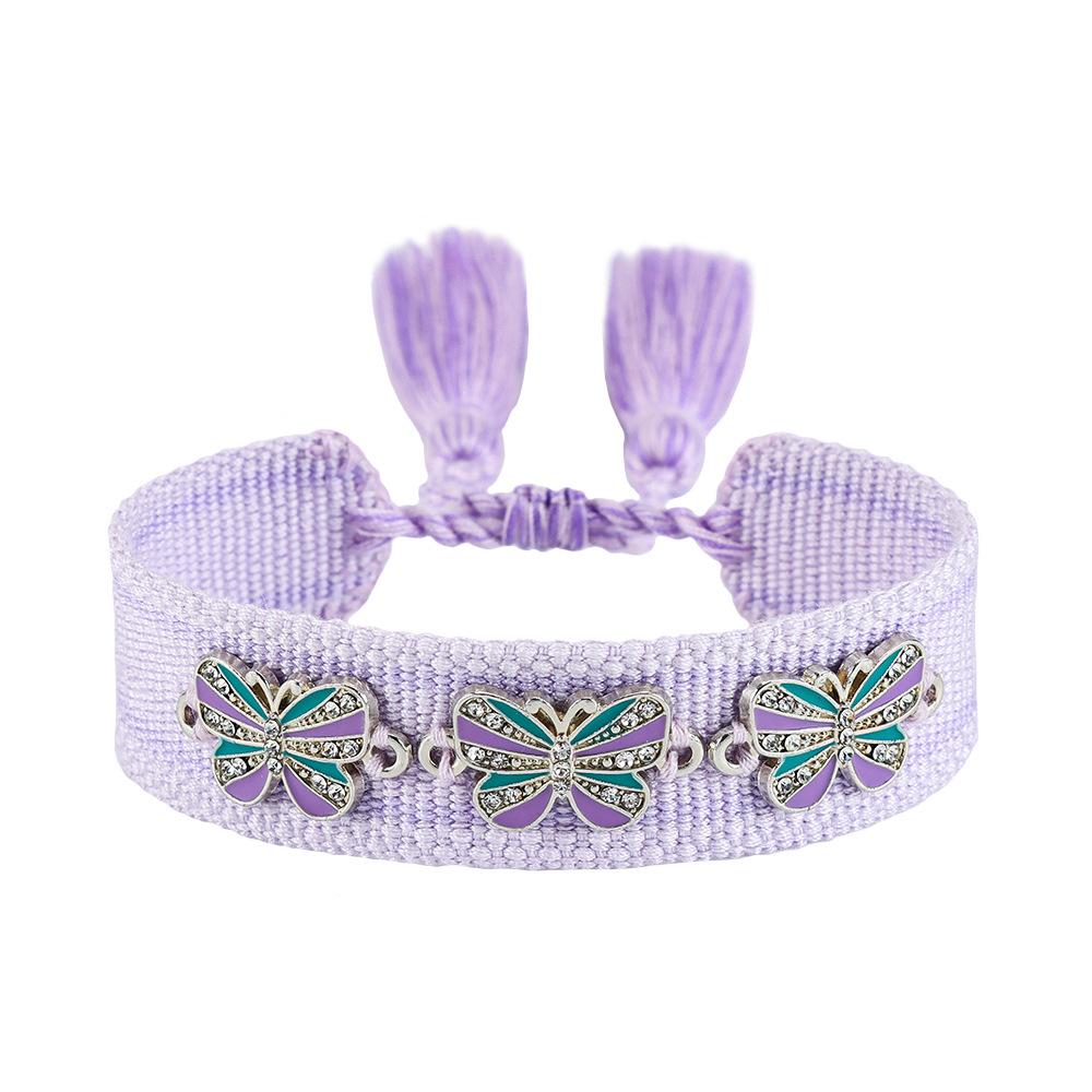 Lucky Evil Eye Tassel Bracelet: Handmade Butterfly & Rivet Design, Woven for Women - European American Style, Personalized Fashion Accessory.
Lucky Evil Eye Tassel Bracelet: Handmade Butterfly & Rivet Design, Woven for Women - European American Style, Personalized Fashion Accessory.