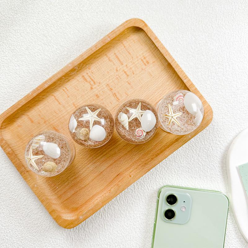 Mobile Phone Airbag Holder Wind Crystal Ball Beach Starfish Shell Small Fresh Retractable Back Sticker Portable
Mobile Phone Airbag Holder Wind Crystal Ball Beach Starfish Shell Small Fresh Retractable Back Sticker Portable
