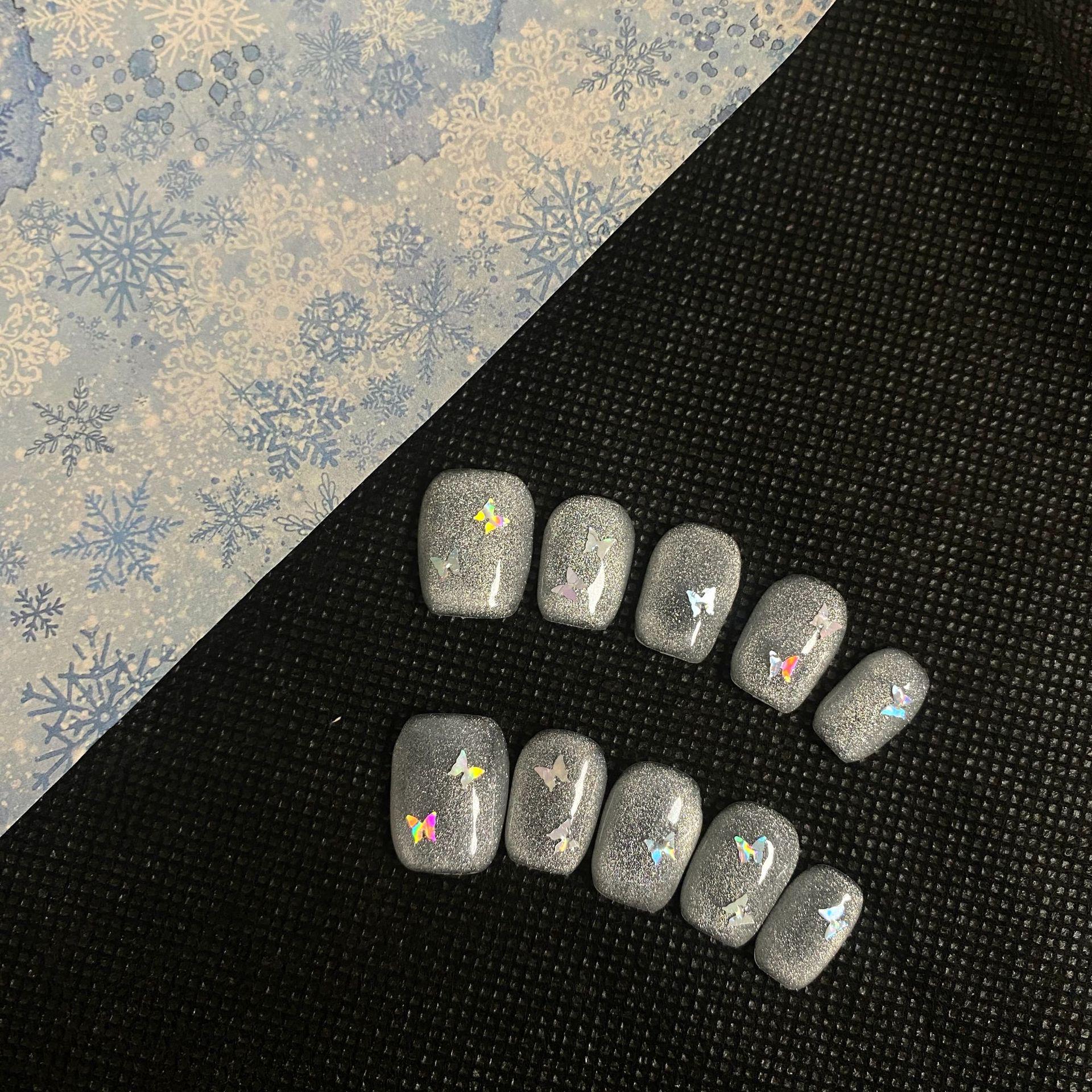 Zhuang Zhou Dreams Butterfly Press-On Nails: Silver White Cat Eye Laser Design, Handmade, Removable 10 pieces with decorations
Zhuang Zhou Dreams Butterfly Press-On Nails: Silver White Cat Eye Laser Design, Handmade, Removable 10 pieces with decorations