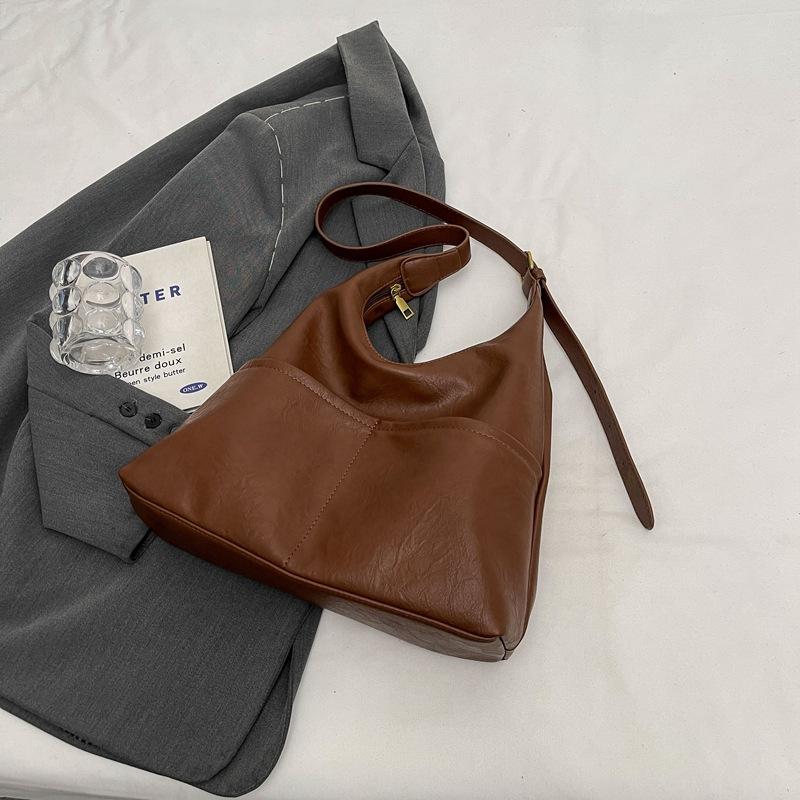 Осінньо-зимова ретро сумка великої місткості Нова жіноча сумка 2024 року популярна сумка на одне плече Сумка для приміських поїздок сумка-відро
Осінньо-зимова ретро сумка великої місткості Нова жіноча сумка 2024 року популярна сумка на одне плече Сумка для приміських поїздок сумка-відро