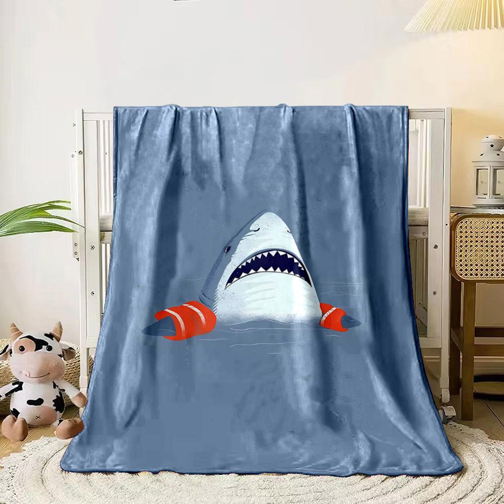 A shark wearing orange swim floaties in water against a blue background. for all seasons blanket lunch break throw gift 80cm x 120cm
A shark wearing orange swim floaties in water against a blue background. for all seasons blanket lunch break throw gift 80cm x 120cm