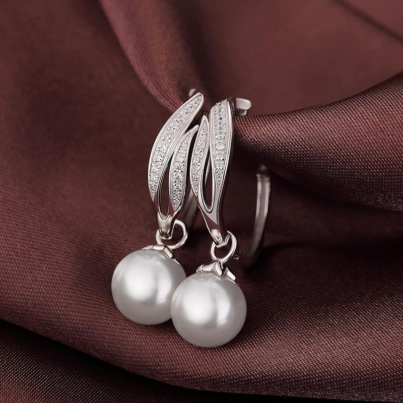 Huitan Simple Elegant Simulated Pearl Hanging Earrings for Bridal Wedding Aesthetic Women s Dangle Earrings Brilliant CZ Zircon
Huitan Simple Elegant Simulated Pearl Hanging Earrings for Bridal Wedding Aesthetic Women s Dangle Earrings Brilliant CZ Zircon