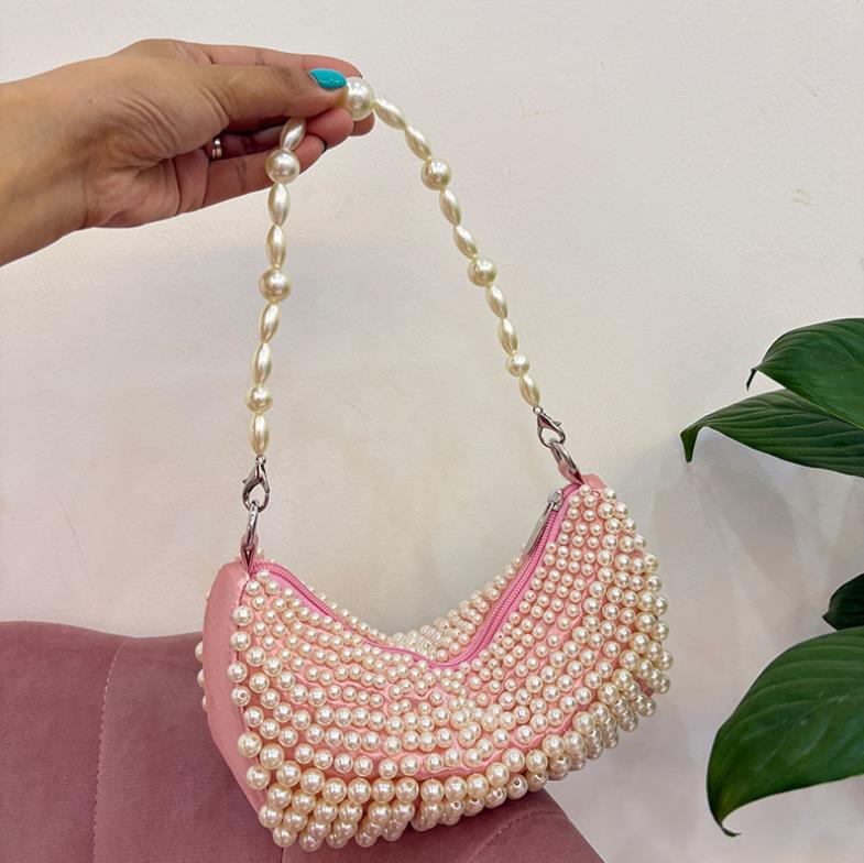 2025 Trend New Simple Women s Pearl Water Diamond High Quality Texture Handmade Bead Weaving Portable Commuter Underarm Bag рожевий
2025 Trend New Simple Women s Pearl Water Diamond High Quality Texture Handmade Bead Weaving Portable Commuter Underarm Bag рожевий