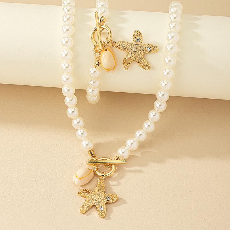Trendy European & American Pearl Bracelet and Necklace Set: Starfish & Seashell Clavicle Chain
Trendy European & American Pearl Bracelet and Necklace Set: Starfish & Seashell Clavicle Chain