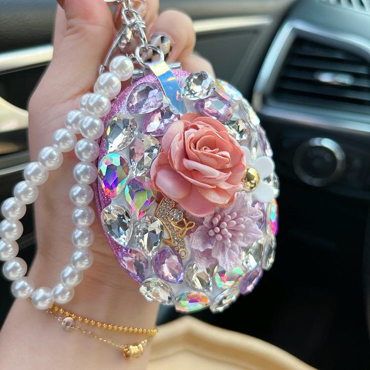 Bling Diamond Two-side Mirror Metal Key Chain With Pearl Chain Makeup Mirror Portable Fold Pocket Mirror Handheld Vanity Glass 15X9X6.5CM фіолетовий
Bling Diamond Two-side Mirror Metal Key Chain With Pearl Chain Makeup Mirror Portable Fold Pocket Mirror Handheld Vanity Glass 15X9X6.5CM фіолетовий