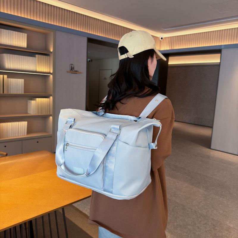 New double shoulder portable large-capacity luggage bag, men s and women s short-distance travel bag, multi-functional double shoulder storage bag небо синє кольору
New double shoulder portable large-capacity luggage bag, men s and women s short-distance travel bag, multi-functional double shoulder storage bag небо синє кольору