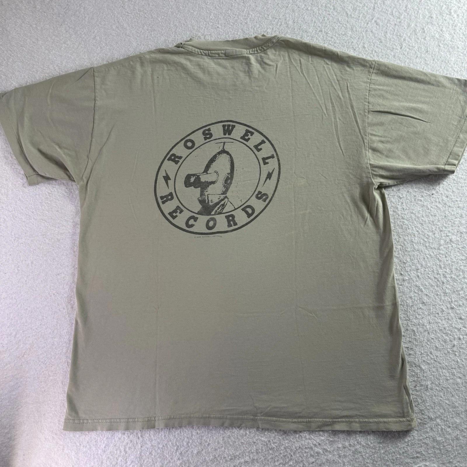 Винтажная футболка Foo Fighters Roswell Records 1995 г. / XL Очень выцветшая, с потертостями 4XL
Винтажная футболка Foo Fighters Roswell Records 1995 г. / XL Очень выцветшая, с потертостями 4XL