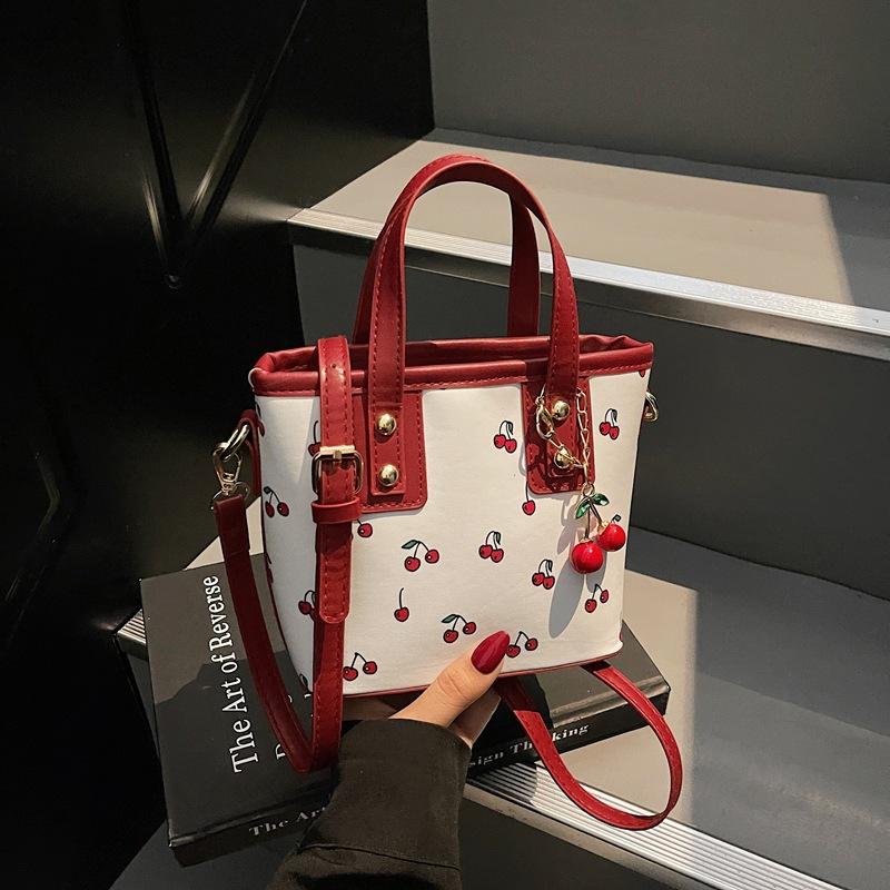 Women PU Cherry Shoulder Bag Large Capacity Trendy Commuting Bag with Cherry Pendant Stylish Crossbody Bag Aesthetic Handbag
Women PU Cherry Shoulder Bag Large Capacity Trendy Commuting Bag with Cherry Pendant Stylish Crossbody Bag Aesthetic Handbag