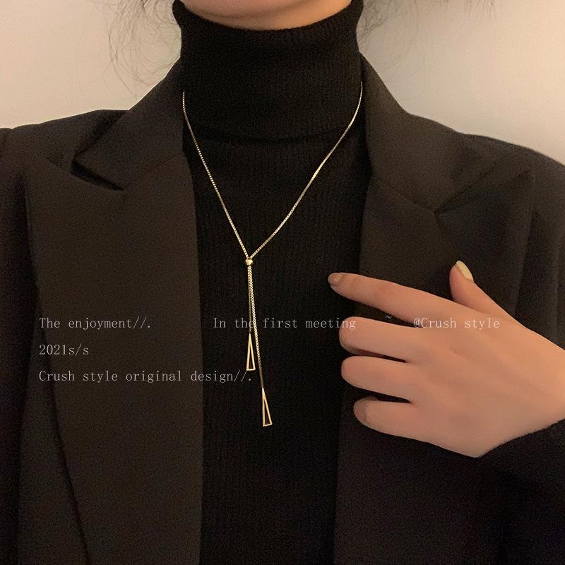 Han Chao geometric triangular necklace, women s tide autumn and winter niche long tassel accessories, light luxury temperament sweater chain
Han Chao geometric triangular necklace, women s tide autumn and winter niche long tassel accessories, light luxury temperament sweater chain