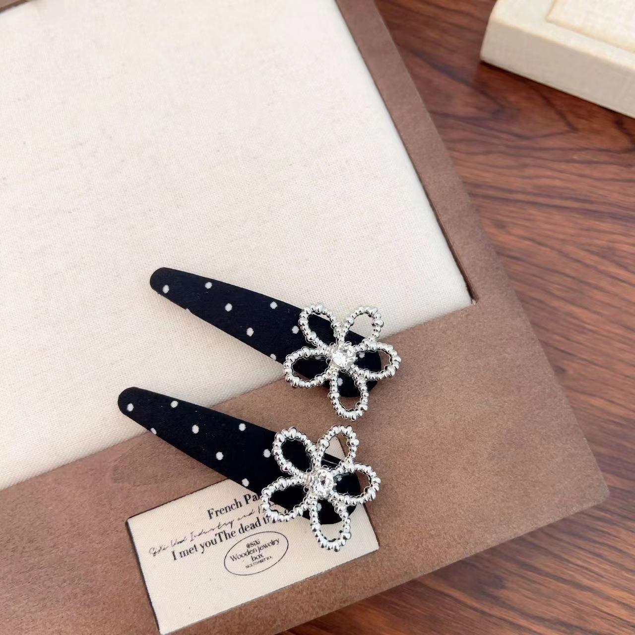 Korean Hepburn-Style Rhinestone Polka Dot Bow Hair Clip
Korean Hepburn-Style Rhinestone Polka Dot Bow Hair Clip