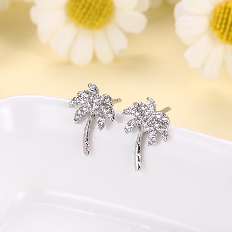Korean Style Coconut Tree Silver Needle Stud Earrings for Women - Simple, Cold Style, Full Diamond Design.
Korean Style Coconut Tree Silver Needle Stud Earrings for Women - Simple, Cold Style, Full Diamond Design.