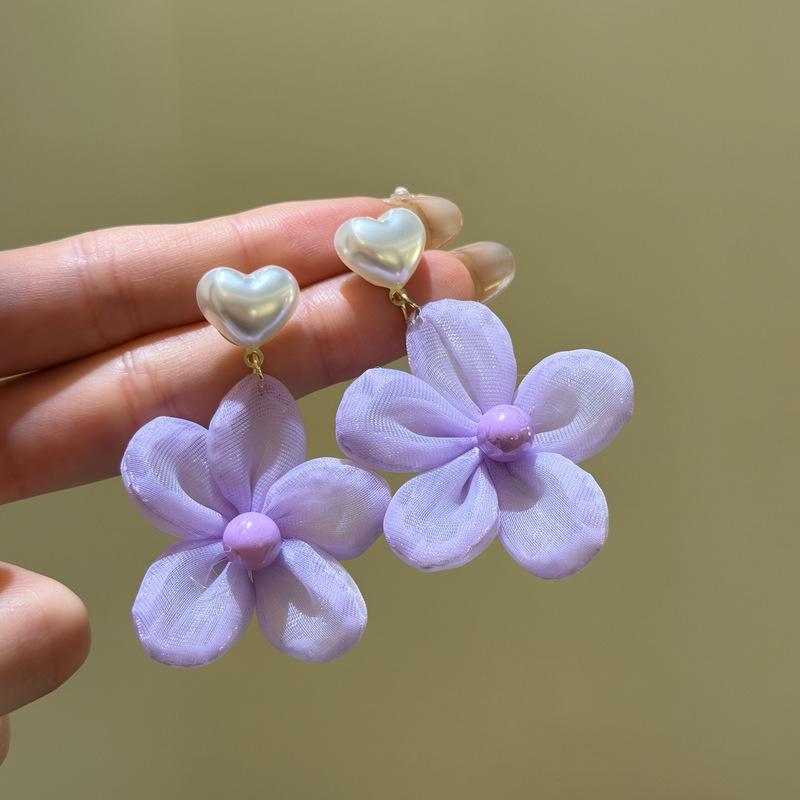Island diary _ super fairy purple flower love pearl stud earrings seaside vacation wind earrings new earrings
Island diary _ super fairy purple flower love pearl stud earrings seaside vacation wind earrings new earrings