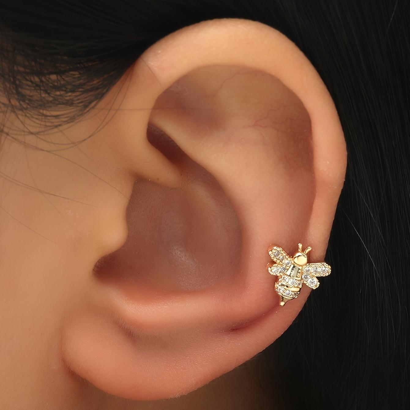 Изысканный дизайн в виде пчелы с блестящим декором из циркона, манжеты для ушей, элегантный милый стиль, ювелирные изделия с медным покрытием, повседневные и повседневные
Изысканный дизайн в виде пчелы с блестящим декором из циркона, манжеты для ушей, элегантный милый стиль, ювелирные изделия с медным покрытием, повседневные и повседневные