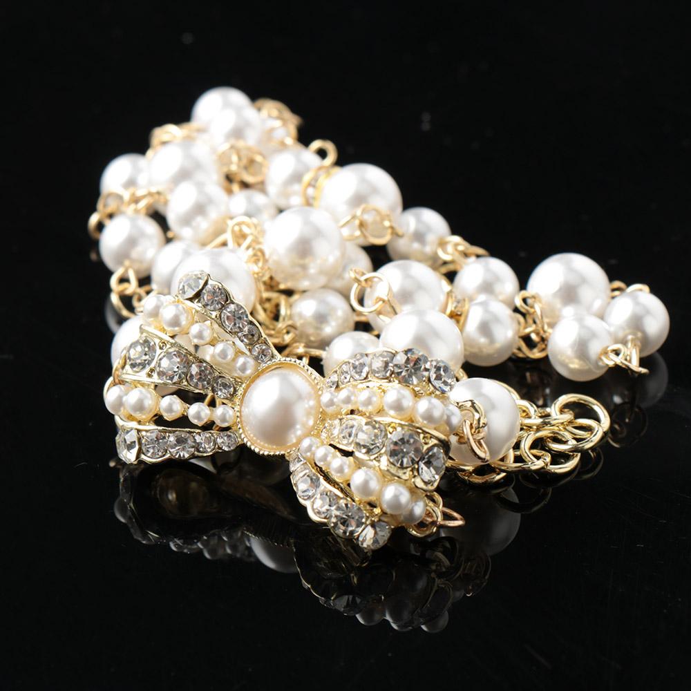 Популярное двухслойное колье с бантом и жемчугом со стразами на ключице
Популярное двухслойное колье с бантом и жемчугом со стразами на ключице