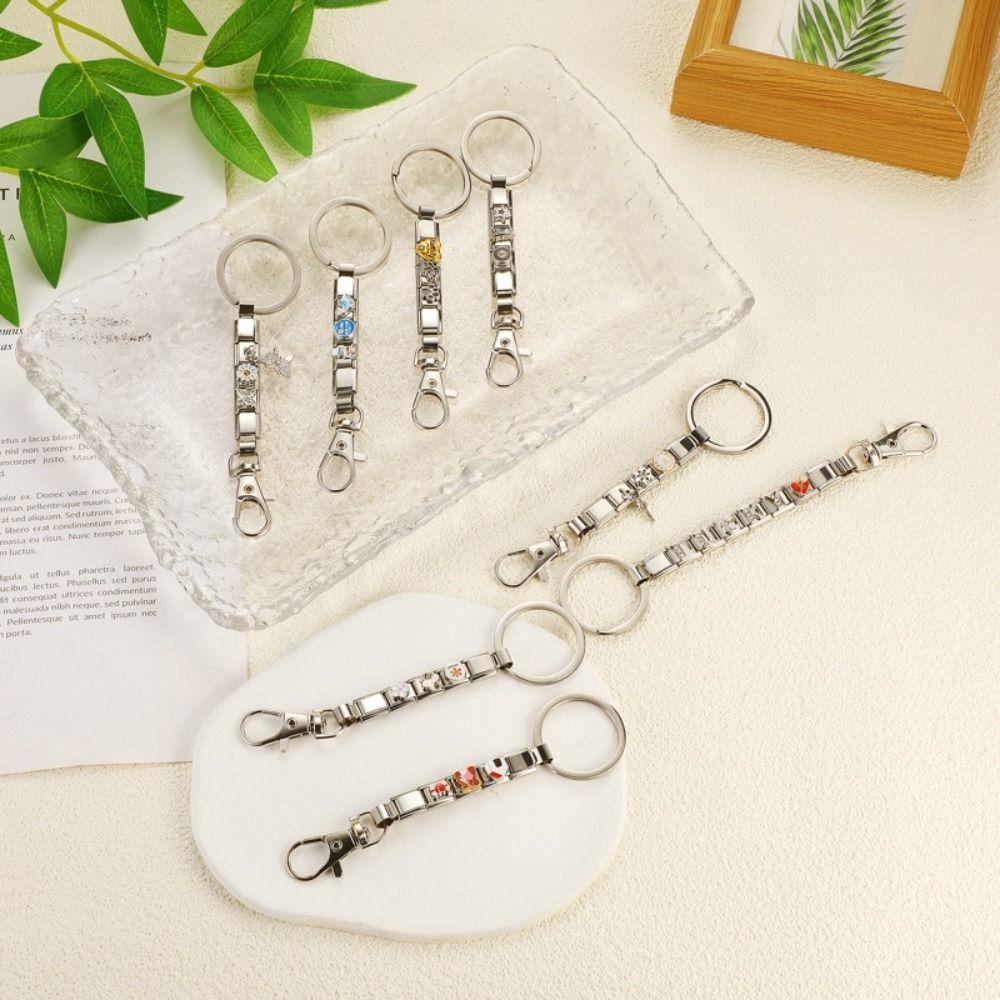 Модная цепочка Love Italian Charm из нержавеющей стали для ключей от автомобиля, модульное кольцо для ключей, женские украшения Style 11
Модная цепочка Love Italian Charm из нержавеющей стали для ключей от автомобиля, модульное кольцо для ключей, женские украшения Style 11