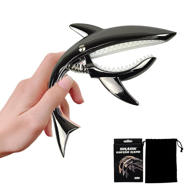 KASELIN one touch shark shape pick guitar capo tasto electric guitar capo tasto ukulele capo guitar High grade zinc alloy strong hold the string on
KASELIN one touch shark shape pick guitar capo tasto electric guitar capo tasto ukulele capo guitar High grade zinc alloy strong hold the string on