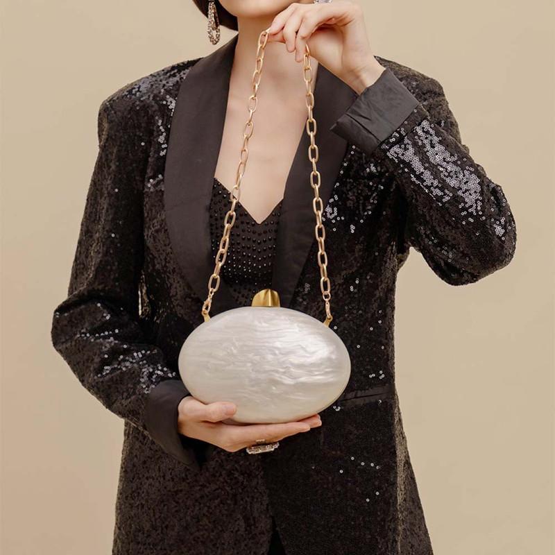 2025 New Design Female Acrylic Egg Shape Clutch Bag Luxury Designer Oval Evening Party Purse Shell Handbag Wedding Shoulder Bag бежевый
2025 New Design Female Acrylic Egg Shape Clutch Bag Luxury Designer Oval Evening Party Purse Shell Handbag Wedding Shoulder Bag бежевый