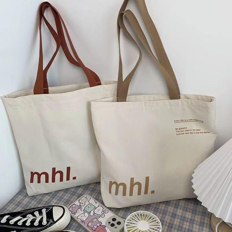 Summer new canvas bag women s niche printing shoulder bag large capacity tote bag червоний
Summer new canvas bag women s niche printing shoulder bag large capacity tote bag червоний