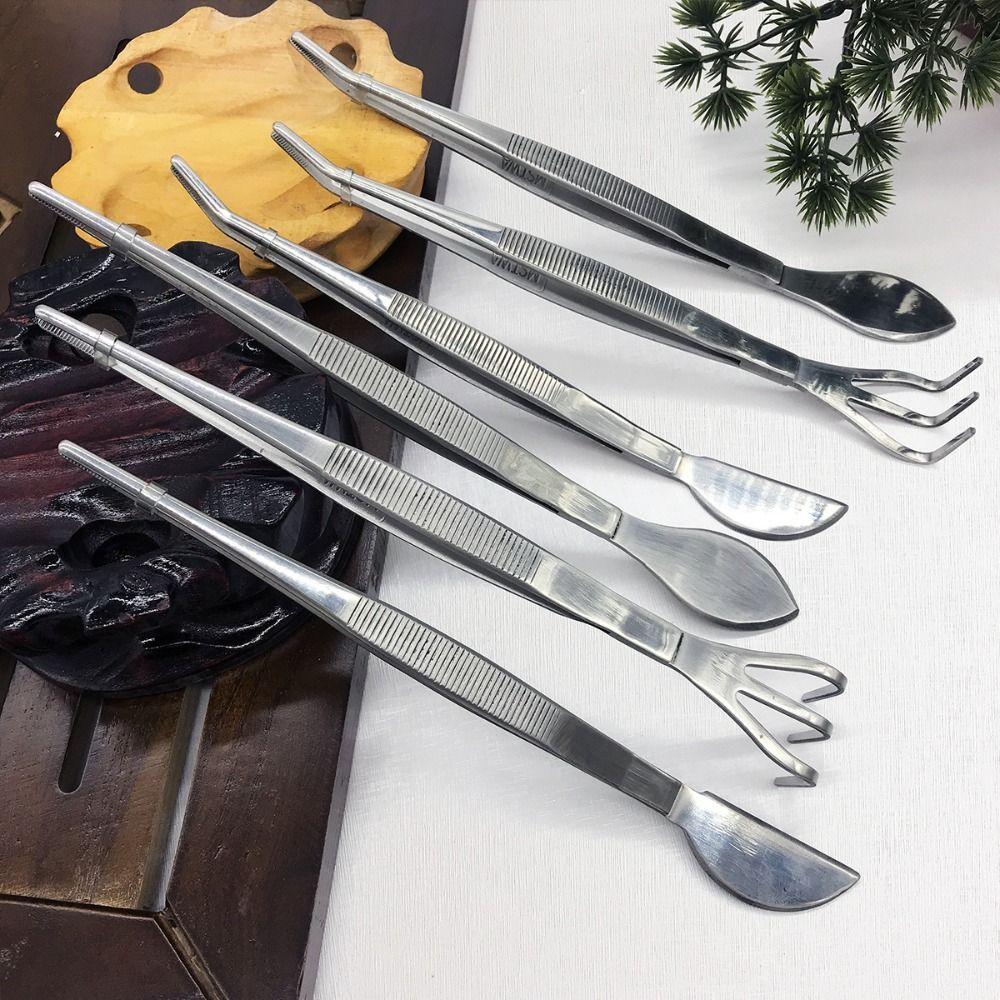 Handheld Stainless Steel Root Rake 2-in-1 Gardening Rake Bonsai Tweezers Loosen Soil Style 5
Handheld Stainless Steel Root Rake 2-in-1 Gardening Rake Bonsai Tweezers Loosen Soil Style 5