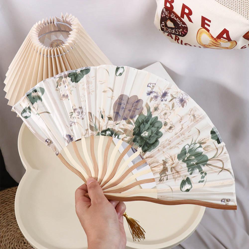 High Quality Tassel Folding Fan Classical Hand Fold Fan Silk Folding Fan Living Room style 1
High Quality Tassel Folding Fan Classical Hand Fold Fan Silk Folding Fan Living Room style 1