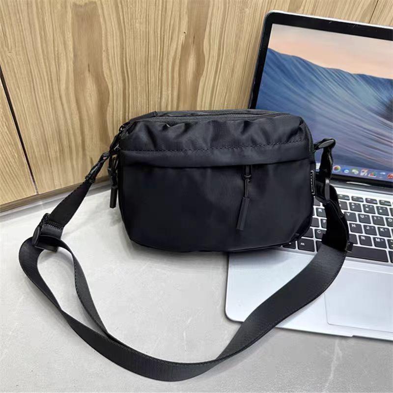 Черная квадратная сумка из ткани Оксфорд, новая легкая повседневная сумка через плечо с несколькими карманами для мужчин и женщин, сумка для мобильного телефона
Черная квадратная сумка из ткани Оксфорд, новая легкая повседневная сумка через плечо с несколькими карманами для мужчин и женщин, сумка для мобильного телефона