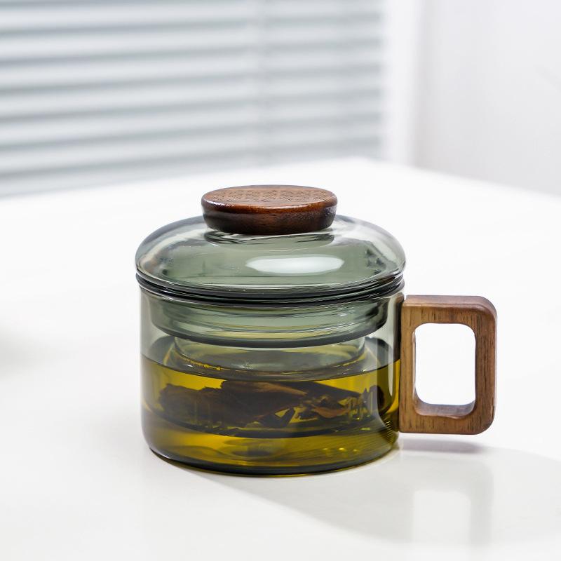 Heat Resistant Glass Tea Cup, Tea Water Separation Wood Handle Cup with Lid, Three Piece Set сірий
Heat Resistant Glass Tea Cup, Tea Water Separation Wood Handle Cup with Lid, Three Piece Set сірий