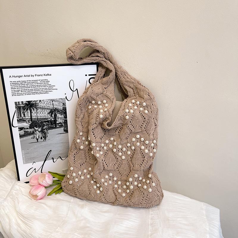 Large capacity crocheted bag women s 2025 spring new fashion shoulder bag casual versatile vacation handbag
Large capacity crocheted bag women s 2025 spring new fashion shoulder bag casual versatile vacation handbag