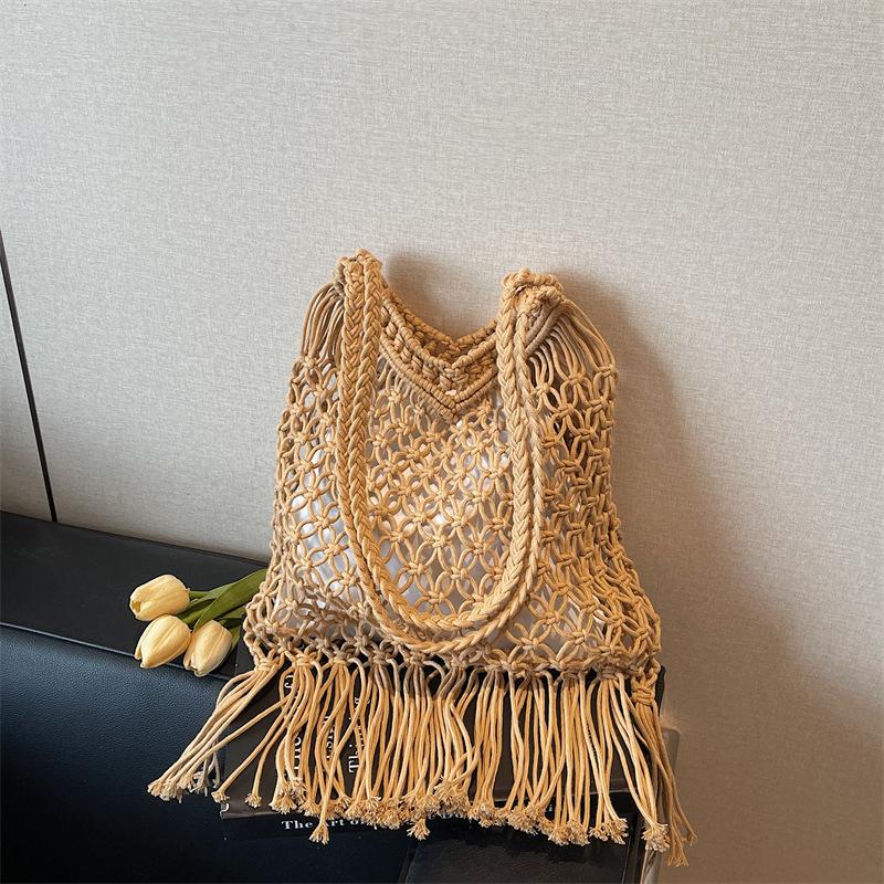 Bohemian tassel hollow woven mesh bag women s new large-capacity vacation wind tote bag хаки
Bohemian tassel hollow woven mesh bag women s new large-capacity vacation wind tote bag хаки