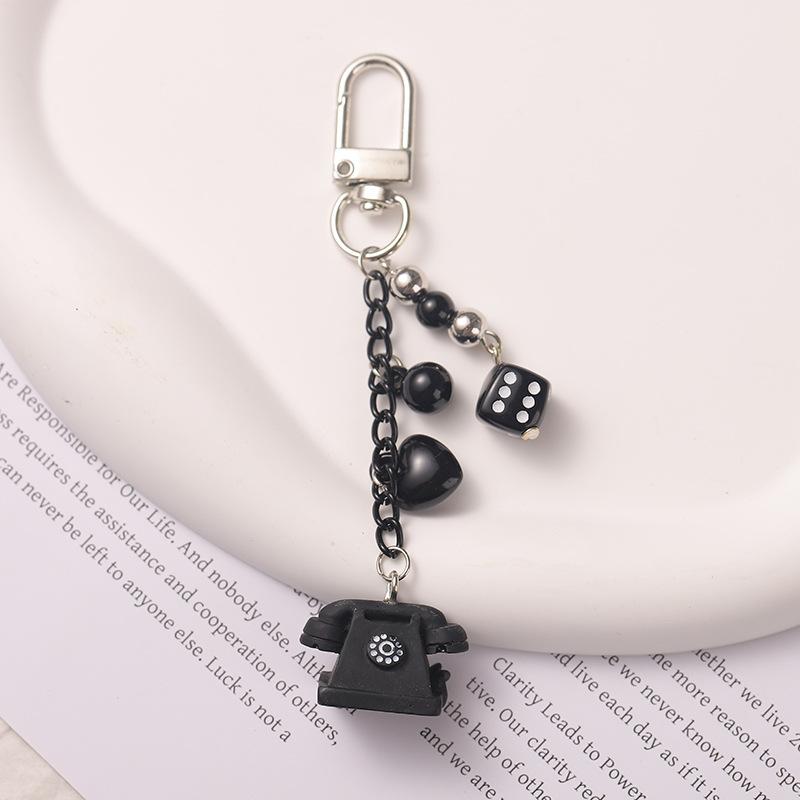 Personalized cool black retro phone mobile phone pendant bag pendant dice ccd camera lanyard keychain bag hanging
Personalized cool black retro phone mobile phone pendant bag pendant dice ccd camera lanyard keychain bag hanging