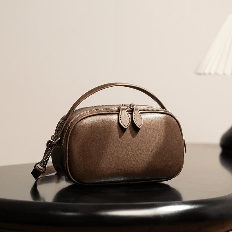 Leather bag women s 2025 spring and summer new camera bag fashion versatile messenger bag portable casual women s shoulder bag кофейный
Leather bag women s 2025 spring and summer new camera bag fashion versatile messenger bag portable casual women s shoulder bag кофейный