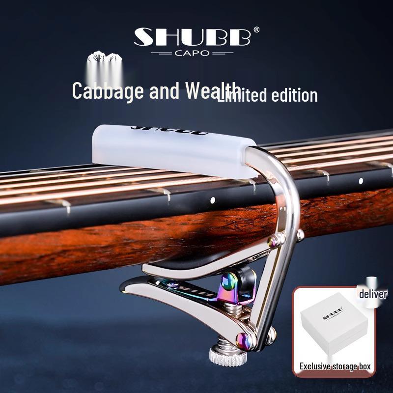 Shubb C1J Xià Bó Capo: Folk Guitar Clip for Classical Tuning, Cabbage Hundred Wealth Design.
Shubb C1J Xià Bó Capo: Folk Guitar Clip for Classical Tuning, Cabbage Hundred Wealth Design.