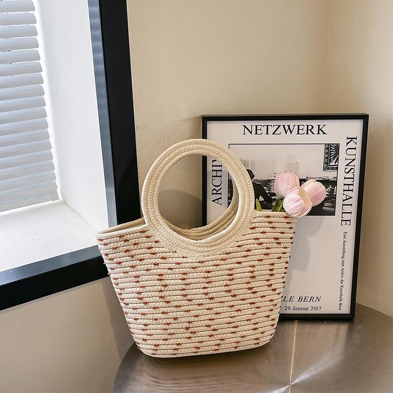 Simple and large-capacity handbag, daily versatile cotton rope woven tote bag, aquatic grass woven vegetable basket bag, handbag.
Simple and large-capacity handbag, daily versatile cotton rope woven tote bag, aquatic grass woven vegetable basket bag, handbag.