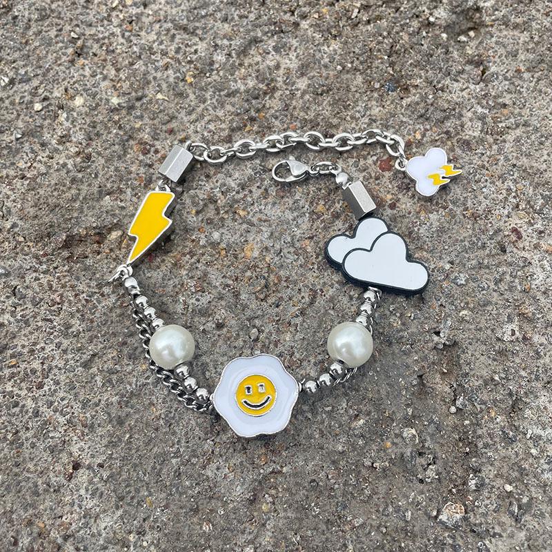 Набор браслета и ожерелья «Подсолнух с улыбающимся лицом и молнией»: Унисекс Хип-хоп Жемчужные Титановые Украшения
Набор браслета и ожерелья «Подсолнух с улыбающимся лицом и молнией»: Унисекс Хип-хоп Жемчужные Титановые Украшения