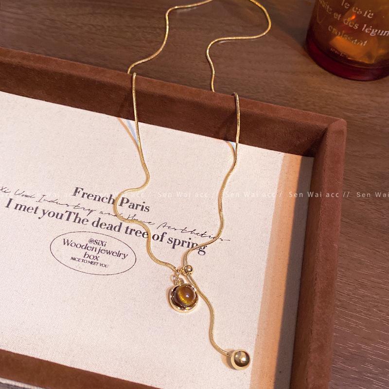 Tiger s eye stone love necklace female Maillard retro temperament long sweater chain with
Tiger s eye stone love necklace female Maillard retro temperament long sweater chain with