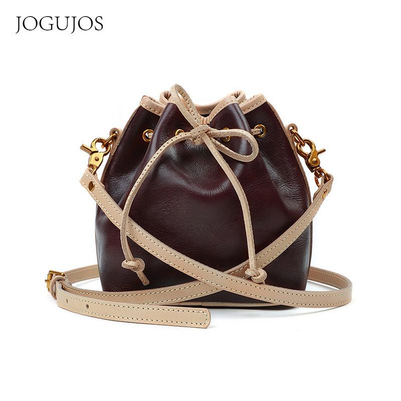 JOGUJOS классическая сумка-ведро с кулиской из кожи растительного дубления, повседневная модная сумка-мессенджер, женская сумка через плечо, женская сумка из натуральной кожи
JOGUJOS классическая сумка-ведро с кулиской из кожи растительного дубления, повседневная модная сумка-мессенджер, женская сумка через плечо, женская сумка из натуральной кожи